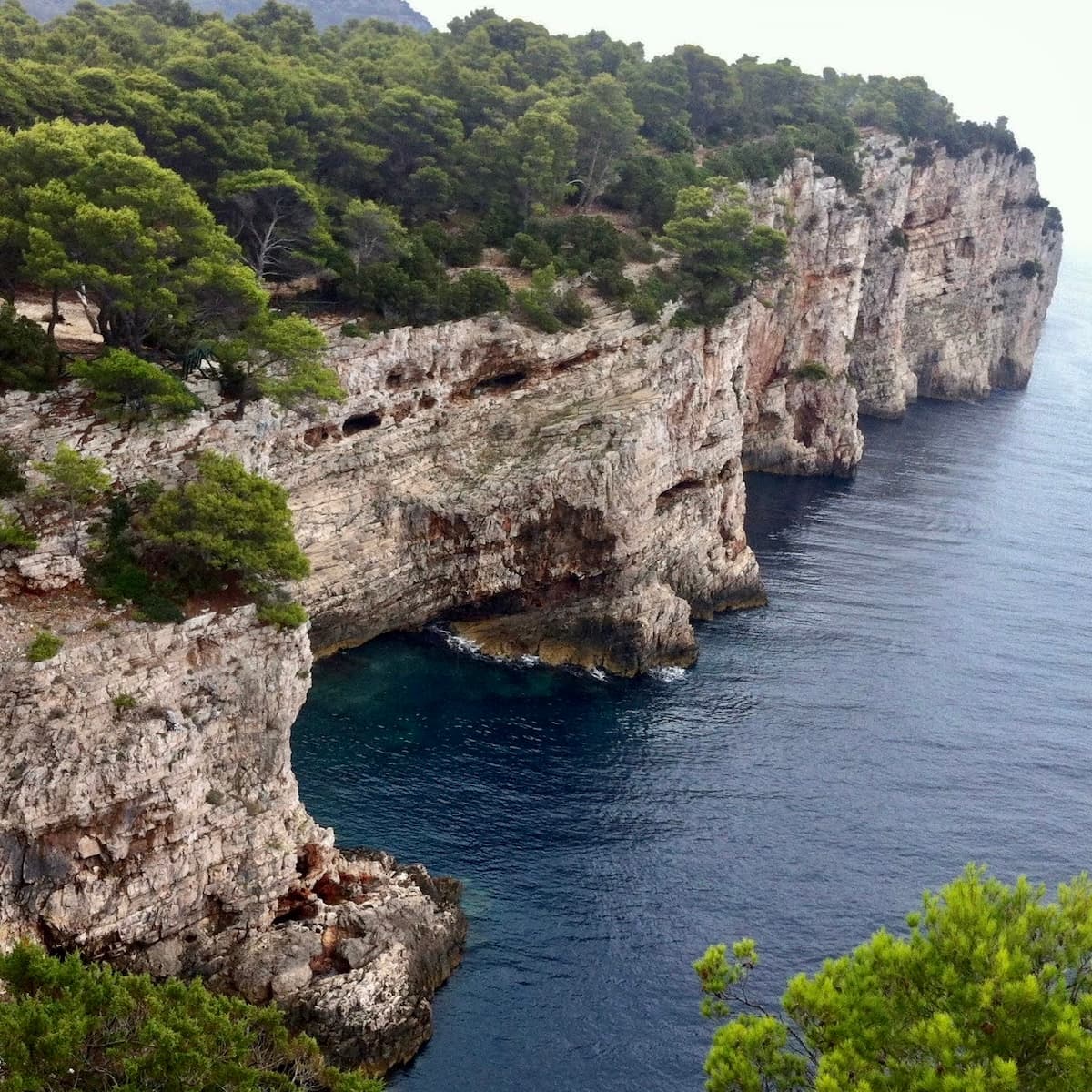 Dramatic view of Stene cliffs plunging into sea in Telašćica