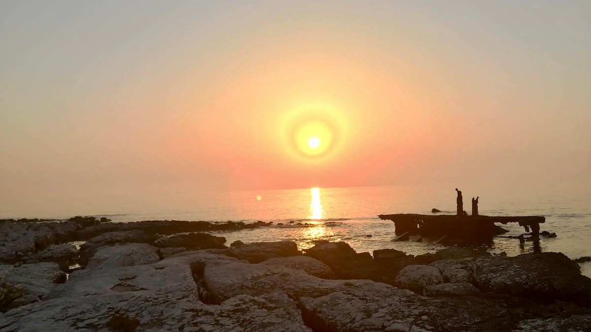 Sunset view from flat rock with Shipwreck Michelle